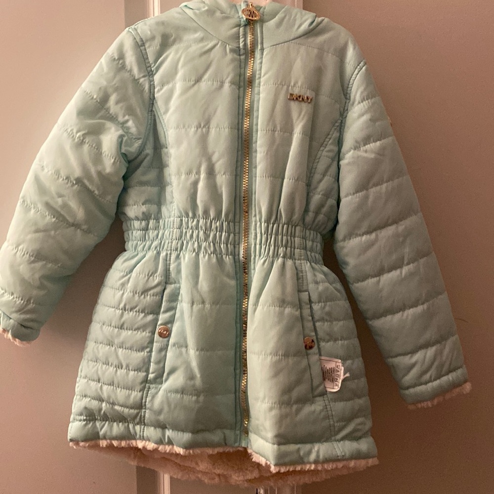 Girls DKNY coat. Excellent condition worn a few times. Light teal color. Size 6X